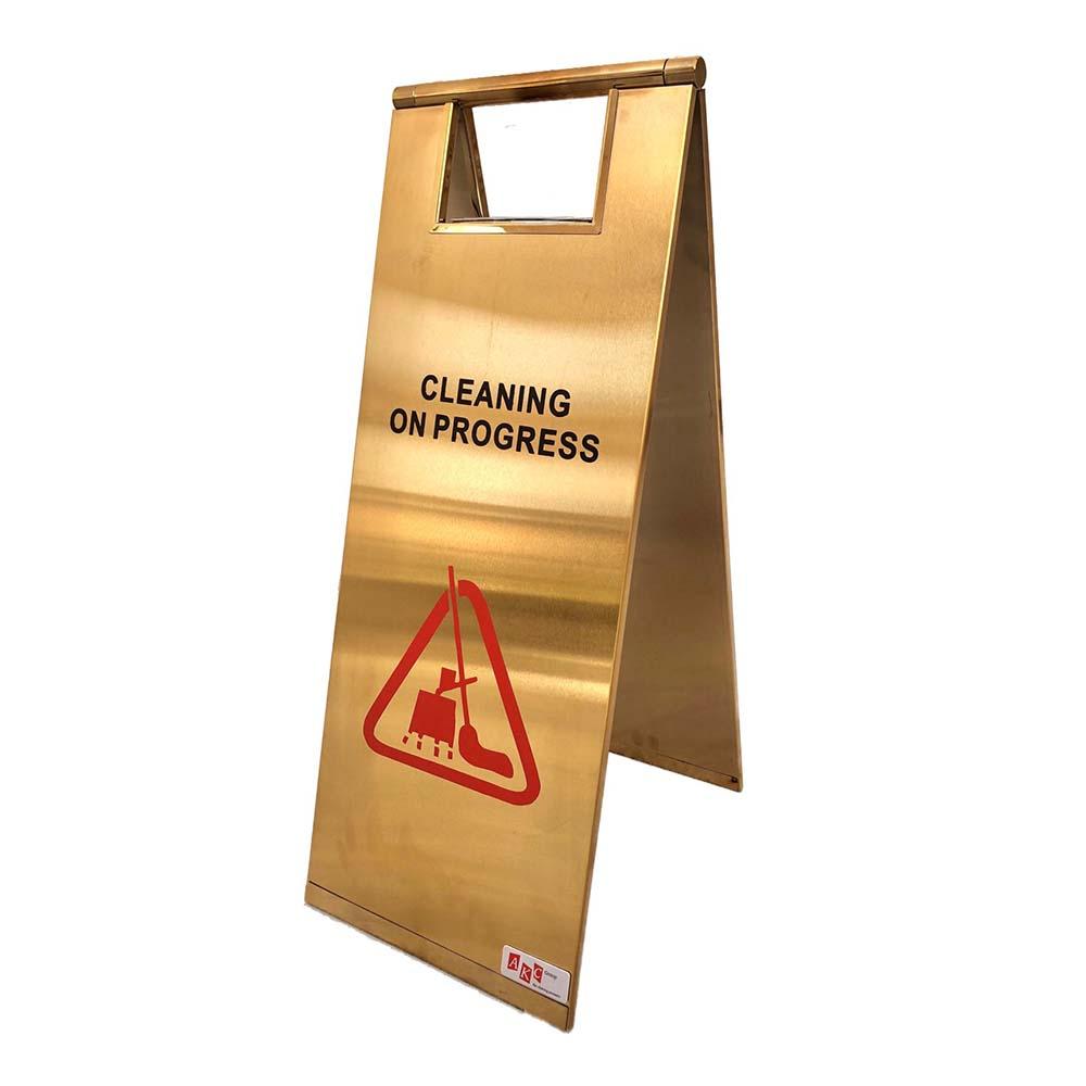 Cleaning on Progress Caution Sign in Golden Color